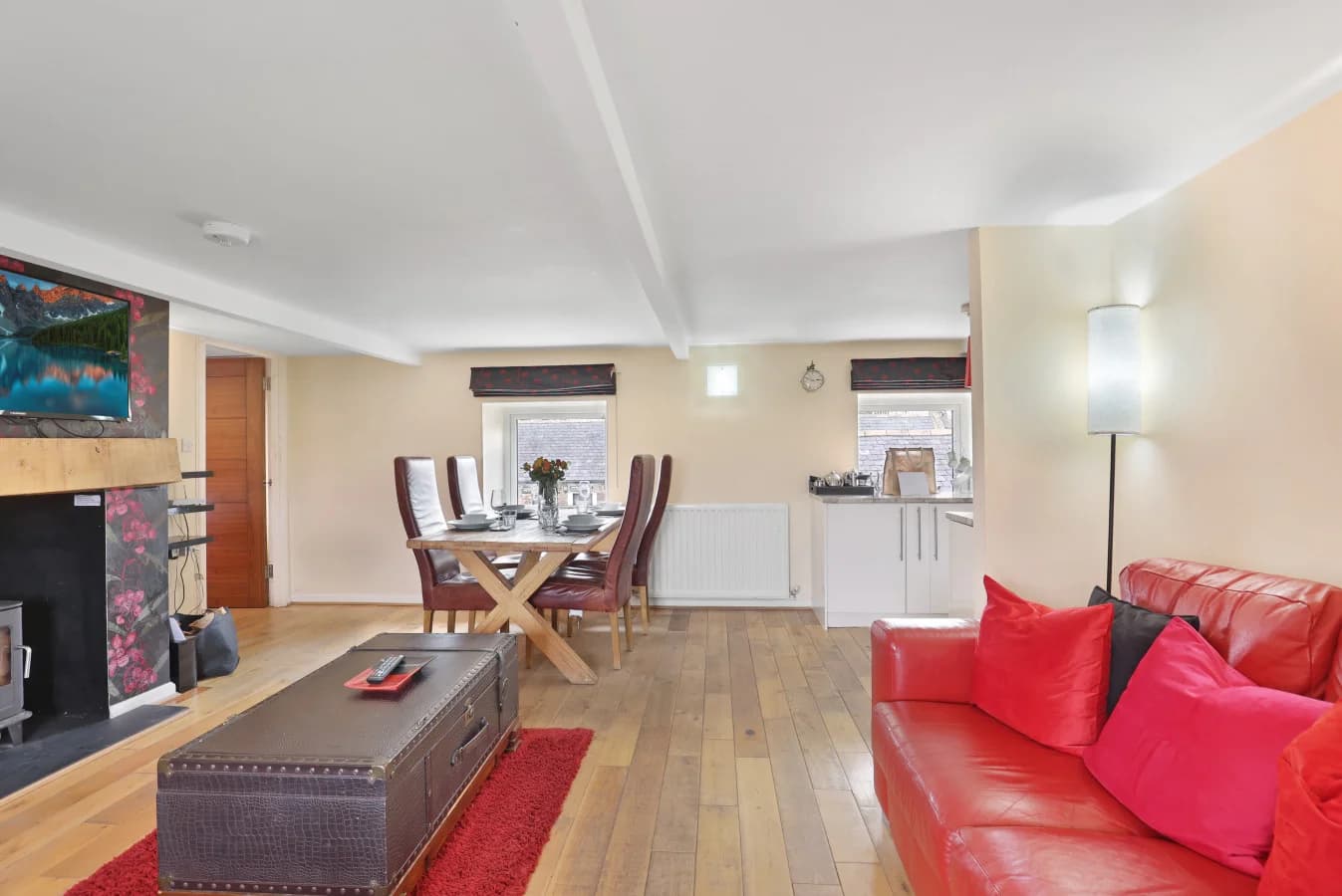 Open-plan living and dining space with fitted kitchen