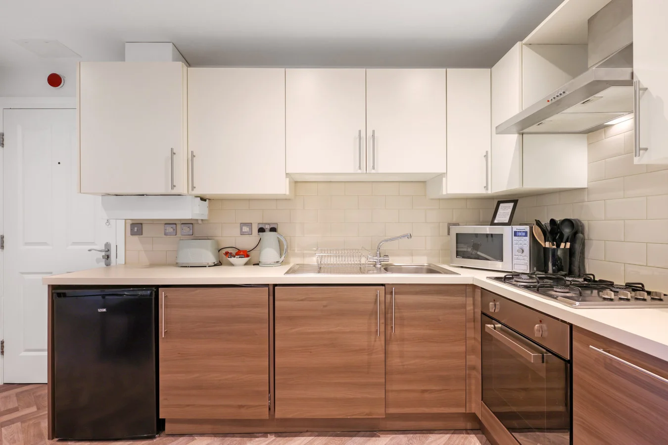 Stylish kitchen with integrated appliances and generous workspace