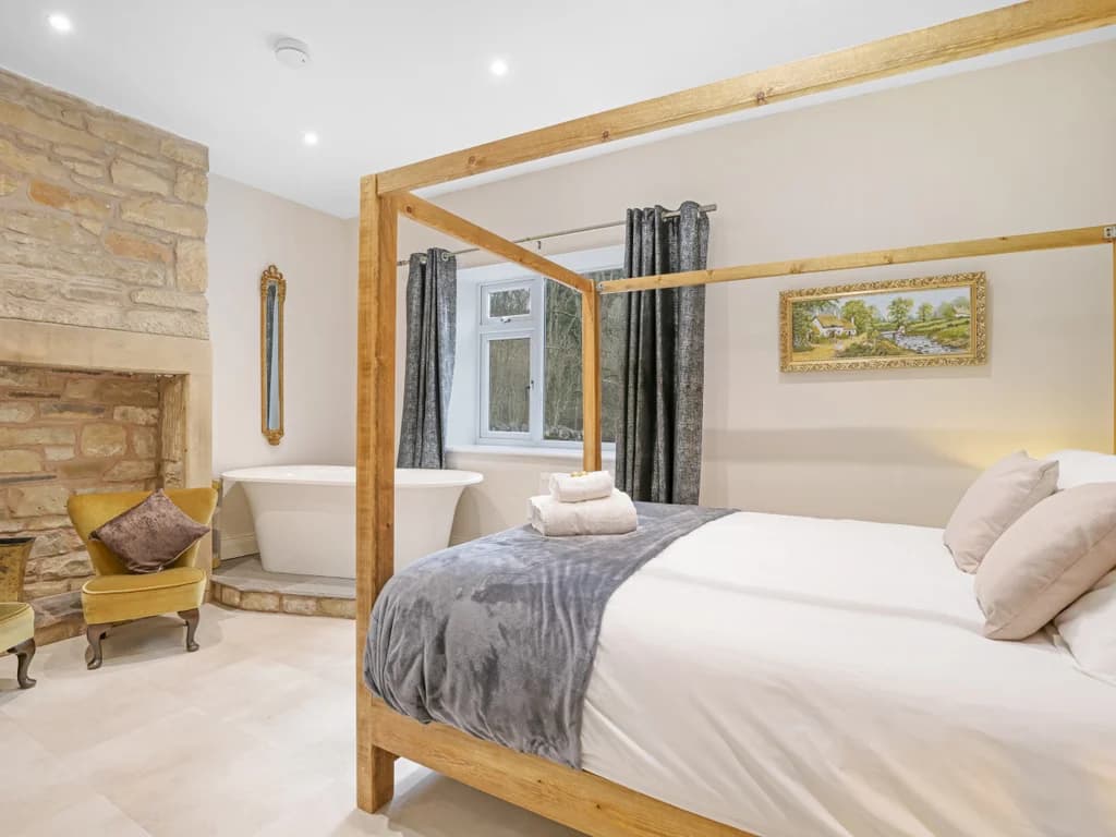 A rustic handmade four-poster bed with a mattress so comfy, you won’t want to leave.