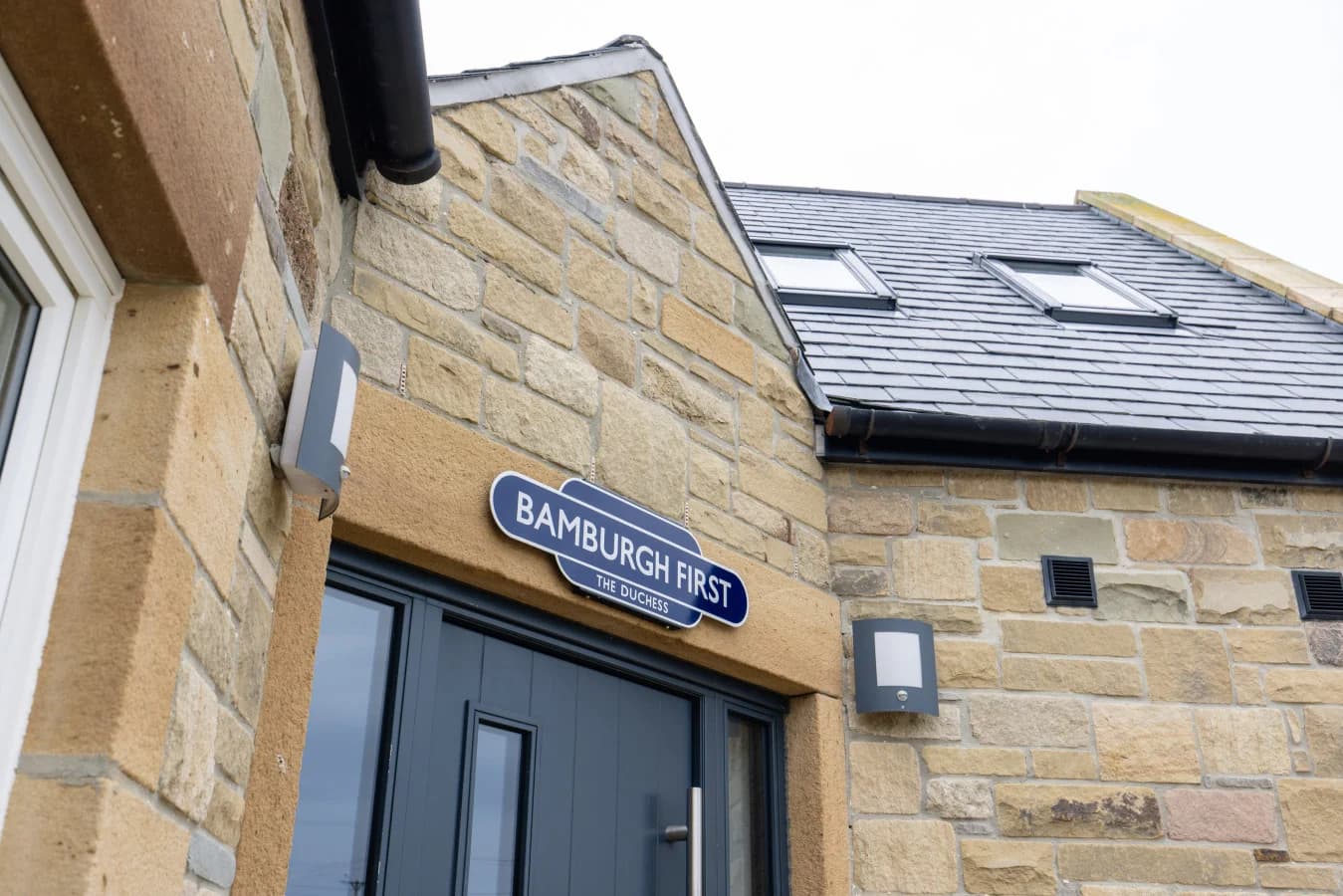 Entrance to The Duchess beneath the Bamburgh First sign