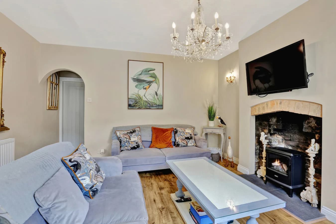 Comfortable lounge with decorative hearth and Smart TV
