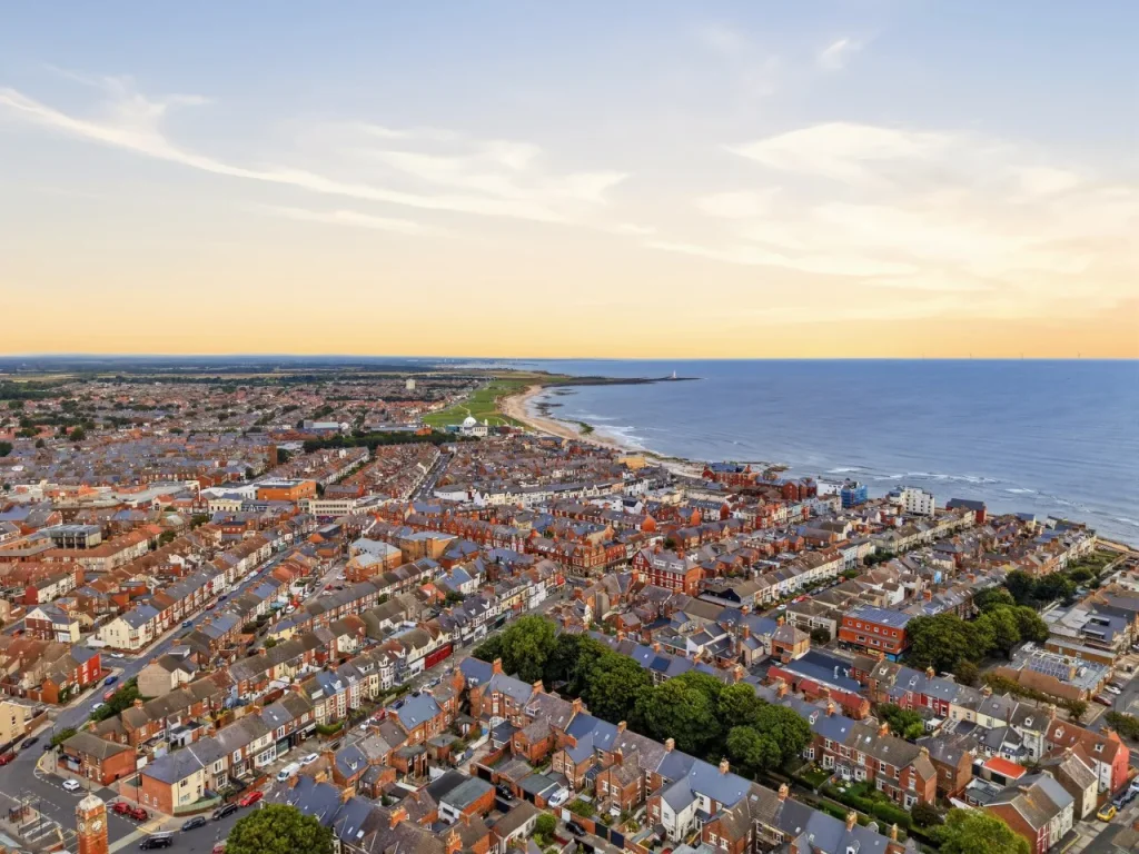Aerial view across Whitley Bay with the coastline stretching into the distance