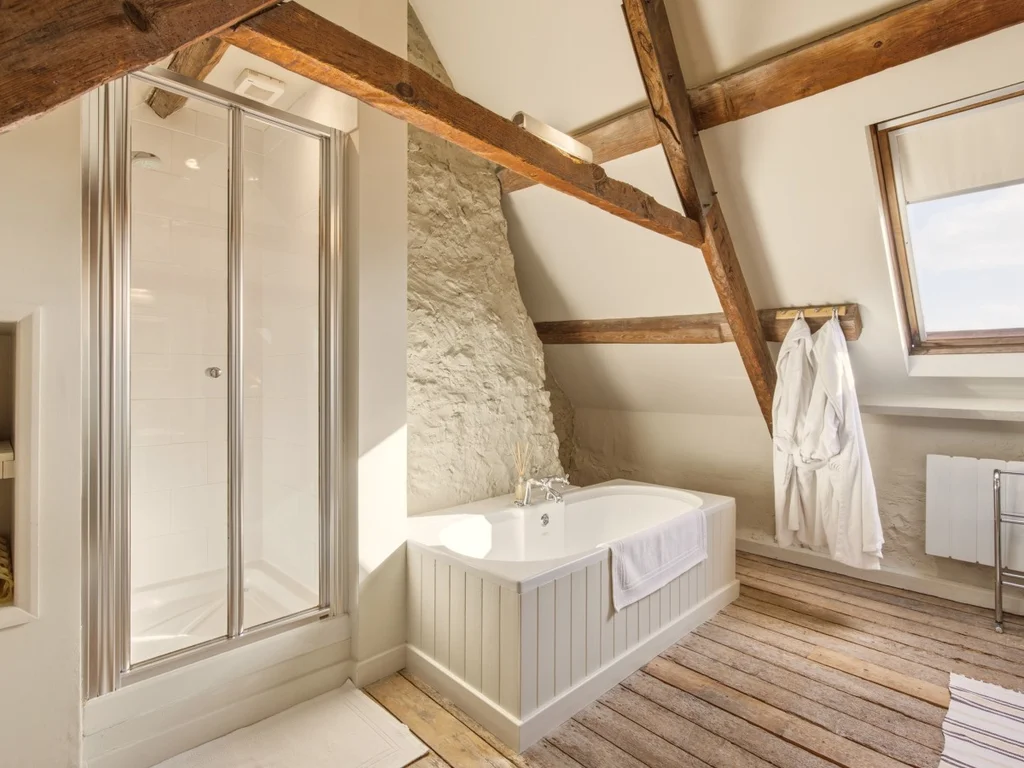 Modern shower enclosure in the characterful ensuite bathroom
