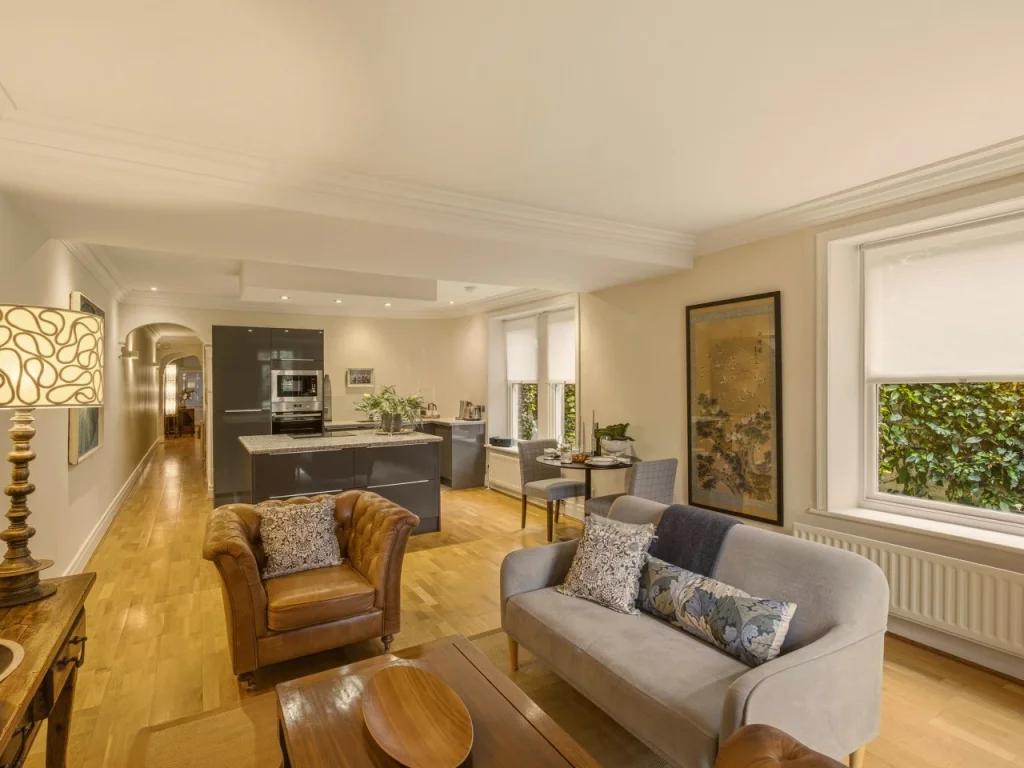 Open-plan living and dining area with views towards the garden