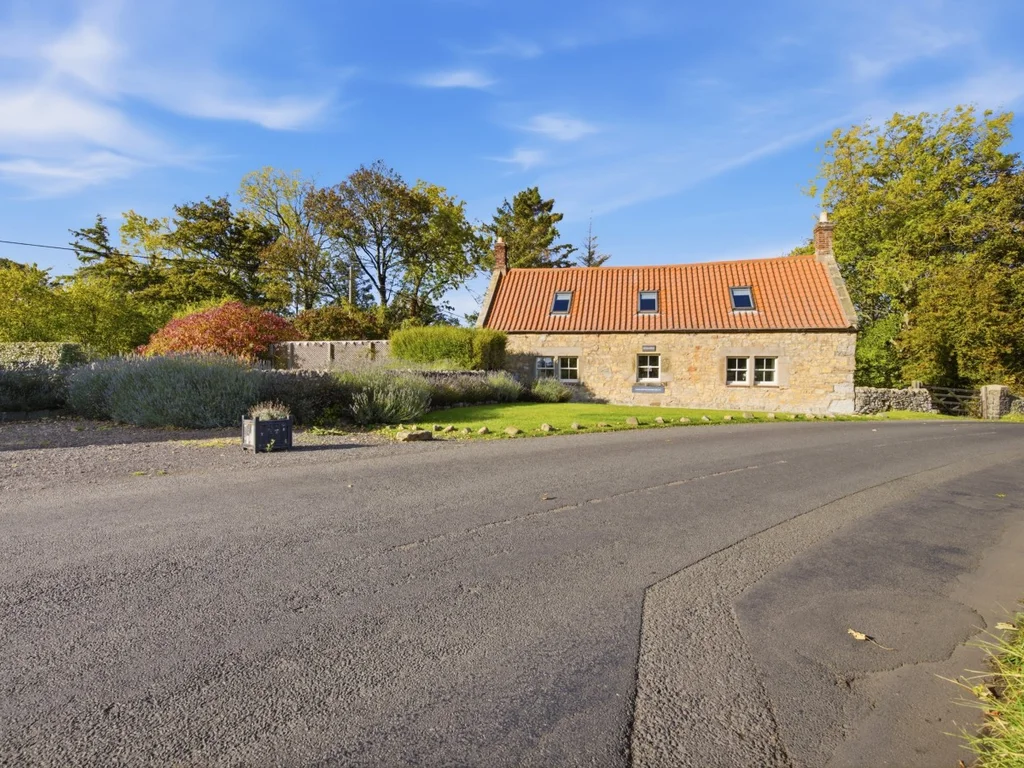 Spitalford's traditional stone frontage viewed from the road