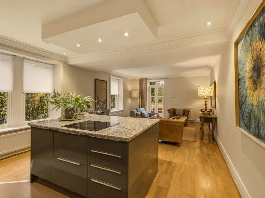 Modern kitchen with a central island and garden views