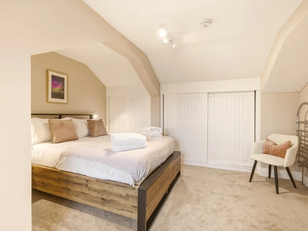Flexible king zip-and-link with countryside views.