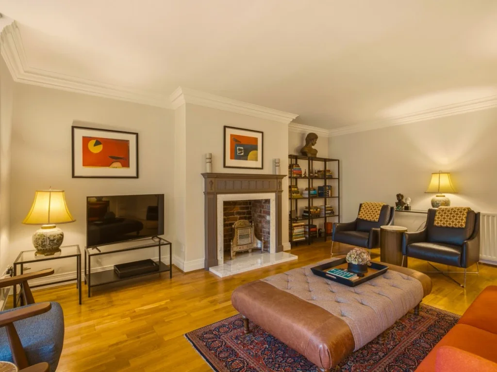 Comfortable lounge with a feature fireplace and stylish furnishings