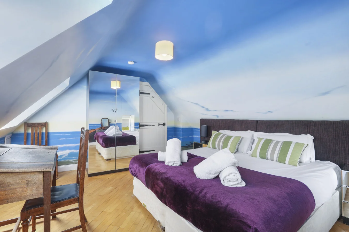 Super king bedroom with sea views and oak flooring