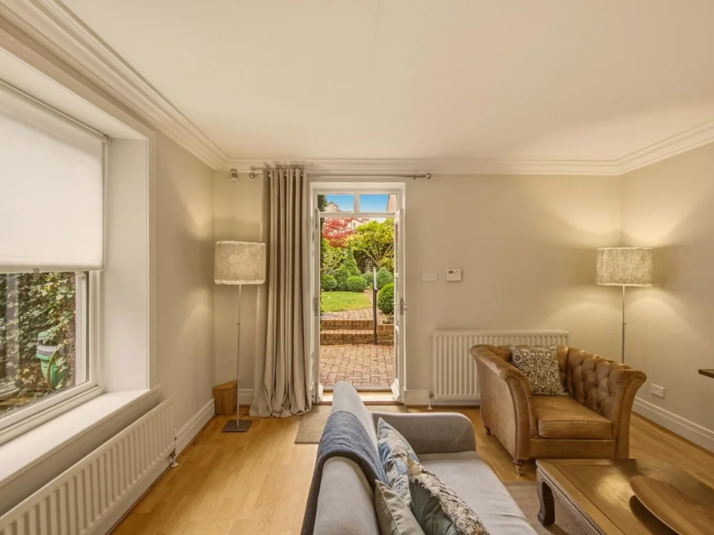 Relax in the sitting area beside the garden-facing window