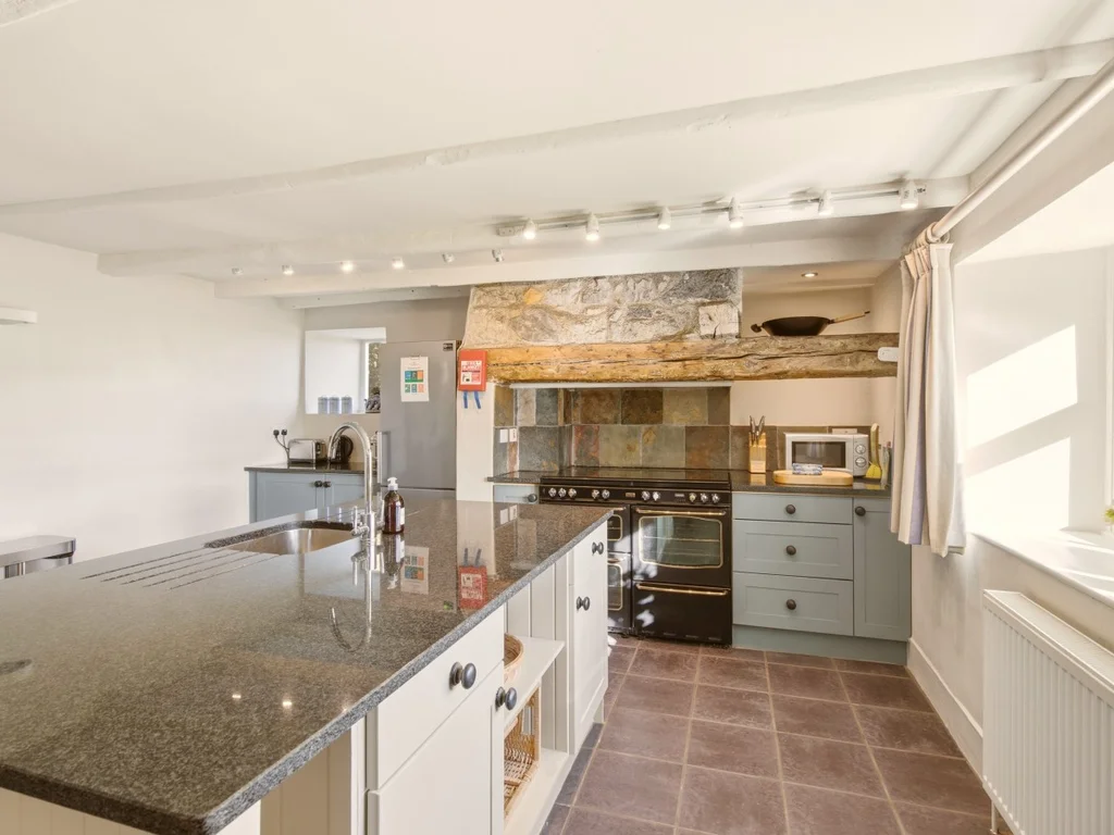 Well-equipped kitchen with ample worktop space and modern fittings