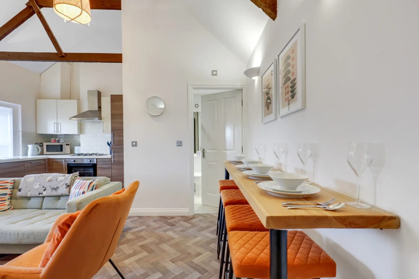 Open-plan dining space flowing seamlessly into the lounge and kitchen