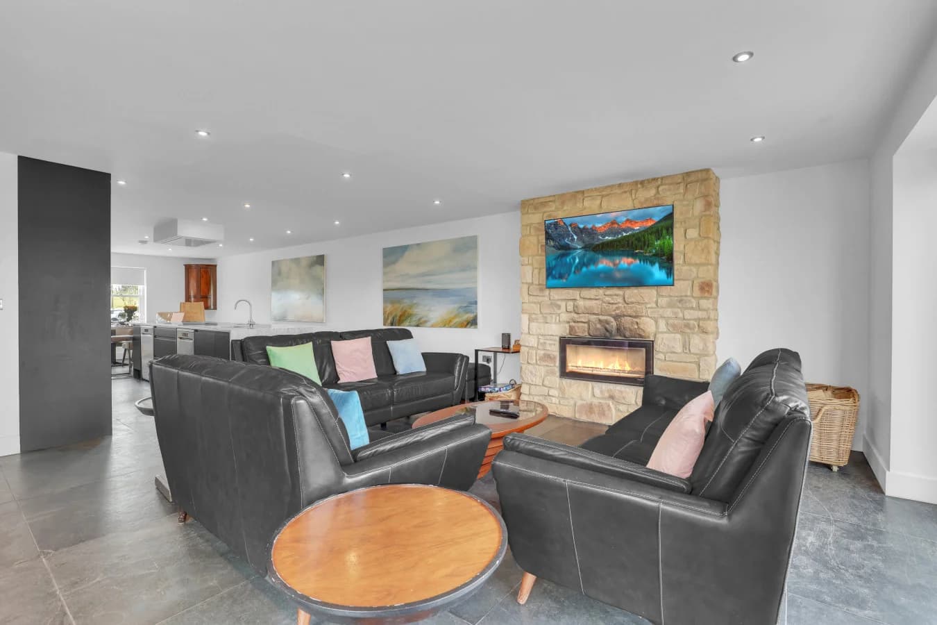 Stylish open-plan lounge with log burner and Smart TV