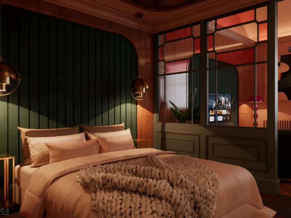 Double bed with green panelled headboard and decorative glazed screen