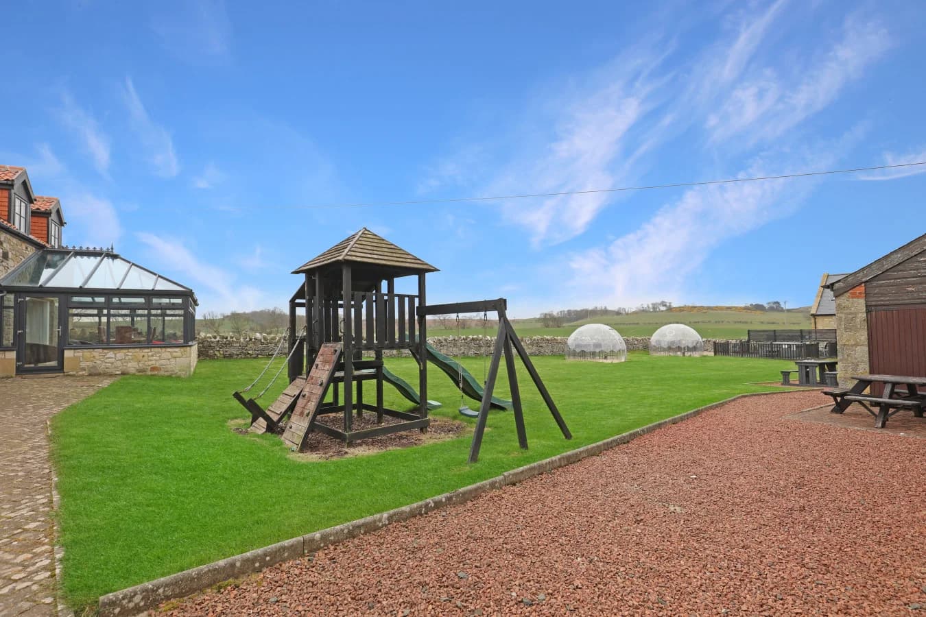 Shared children's play area and paddock