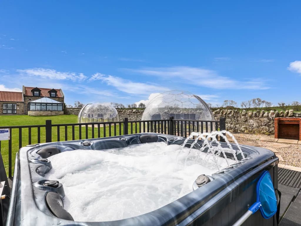 Shared hot tub beside the paddock and garden pods